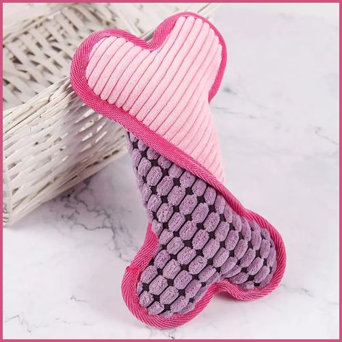 jouet-pour-chien_en-forme-d-os-grinçant-en-peluche-rose